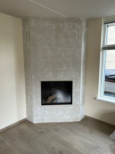 Luxe inbouw gashaard als roomdivider gerealiseerd door Versteeg Haarden